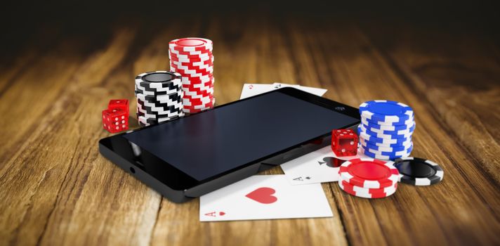 Composite image of mobile phone with casino tokens and playing cards