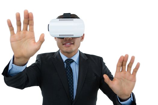Businessman gesturing while wearing vr glasses