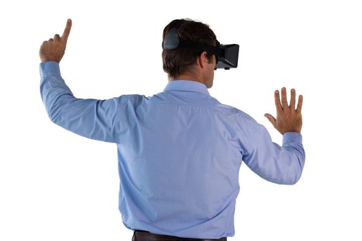 Businessman wearing VR glasses pointing