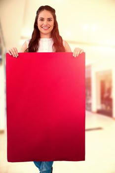 Composite image of women holding blank poster 