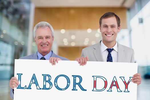 Business men holding a Labor Day card