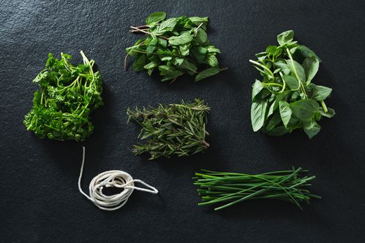 Various type of herbs and rope
