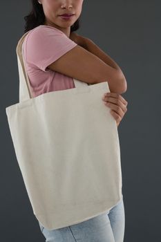 Woman carrying shoulder bag