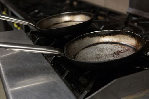 Empty pan on gas stove