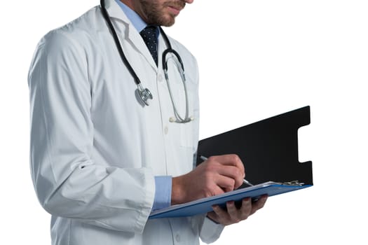 Mid-section of male doctor writing on clipboard