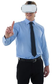Young businessman gesturing using wearable computer