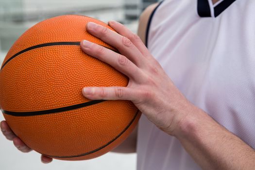 Player holding basketball