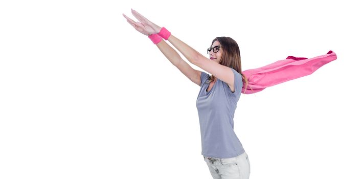 Woman in superhero costume pretending to fly 