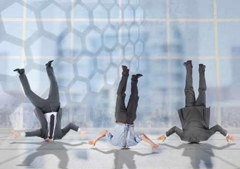 3 business people stuck upside down with transition background