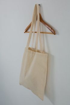 Beige bag on hanger