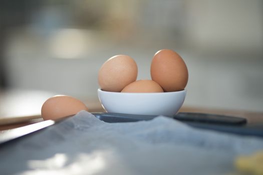 Bowl of eggs on kitchen worktop