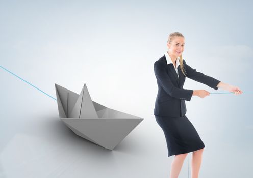 Businesswoman pulling paper boat with rope