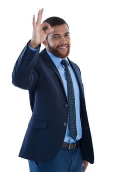 Businessman gesturing okay hand sign