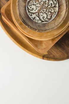 Wooden plates set on dinning table