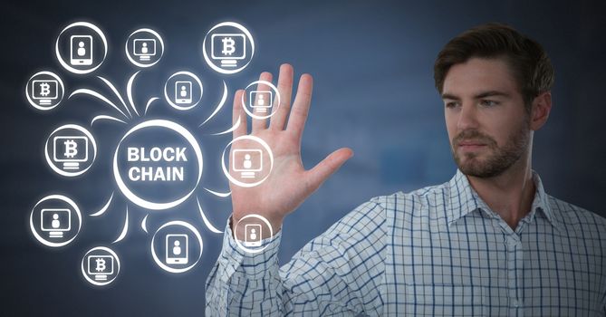 Businessman touching blockchain graphics