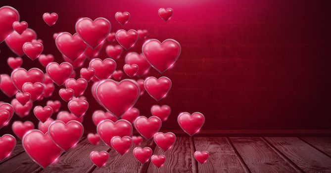 Shiny bubbly Valentines hearts over wooden floor