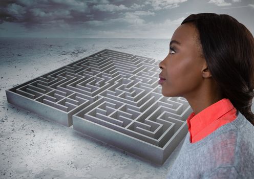 Young woman looking past maze