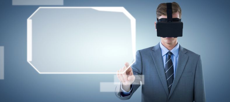 Composite image of businessman pointing finger while using virtual reality headset
