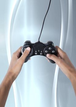 Hands holding gaming controller