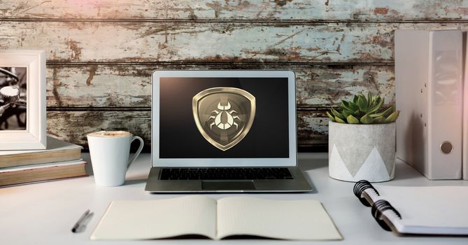 Bug ransomware and Antivirus security protection shield on laptop