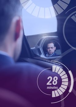 Man in driverless autonomous car with heads up display interface