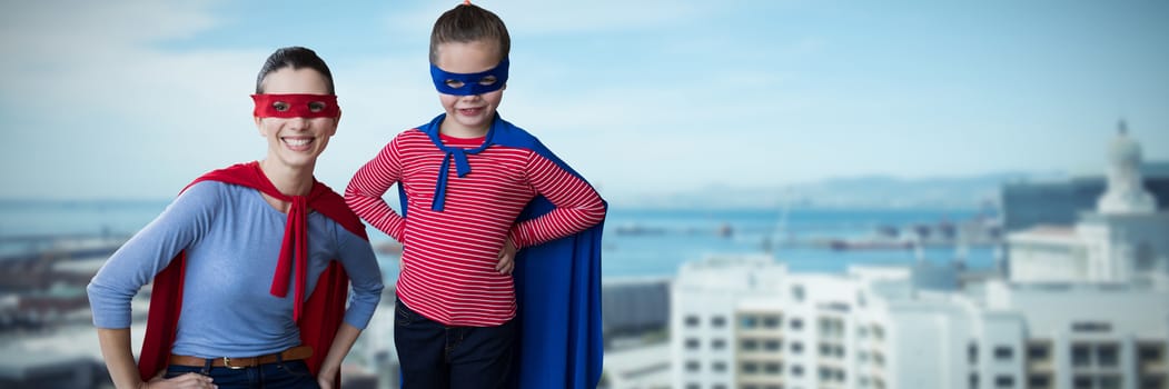 Composite image of mother and daughter pretending to be superhero