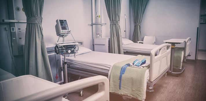 Empty hospital beds in hospital