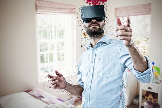 Composite image of low angle view of man using oculus rift headset