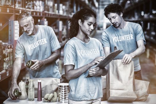 Volunteers working in a warehouse