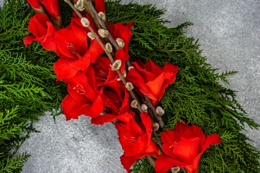 Composition with red gladiolus flowers