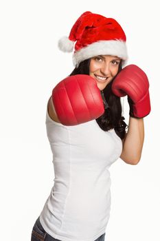 Woman punching with boxing gloves