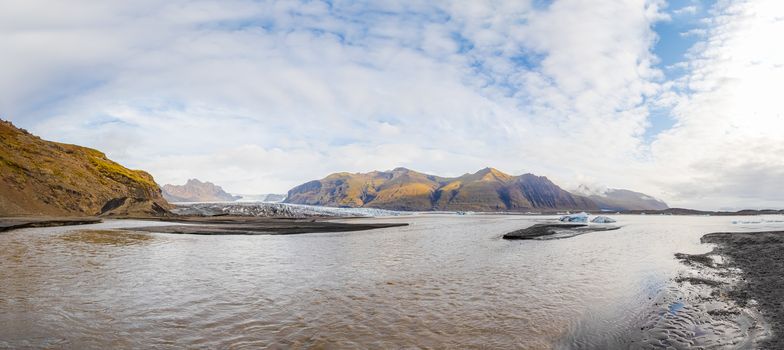 Vatnajoekull glacier in Iceland panorama of glacier lake in front of the ice shield