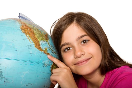 Cute pupil smiling with globe