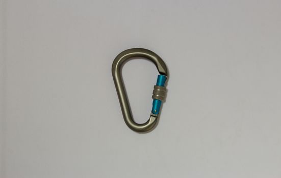 Pear shaped screw gate carabiner used in rock climbing