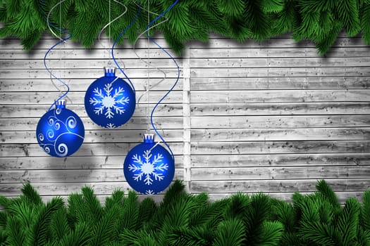 Composite image of digital hanging christmas bauble decoration 