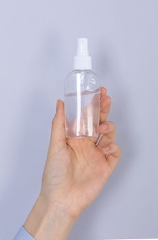 Close up woman hands using hands sanitizer alcohol gel