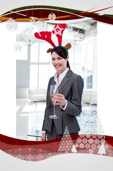 Smiling businesswoman with a novelty christmas hat toasting with champagne 