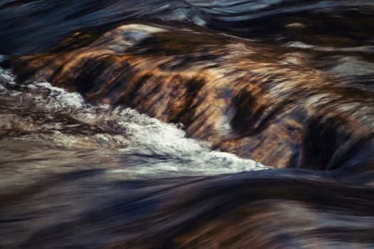 abstract background nature autumn waves on the river