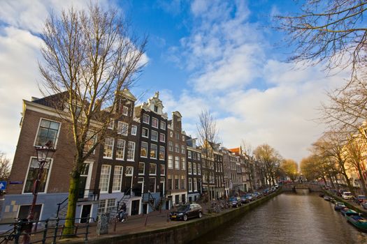 dayligh canal view in amsterdam during winter