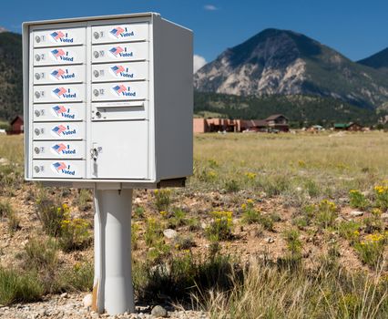 USPS metal mailboxes for rural homes with I voted stickers for vote by mail