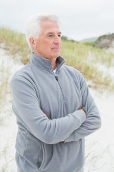 Contemplative senior man at beach