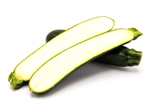 Close up on a fresh zucchini and cut 