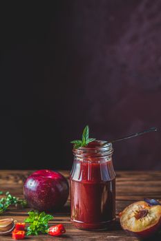 Homemade DIY natural canned hot plum sauce chutney with chilli o