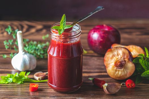 Homemade DIY natural canned hot plum sauce chutney with chilli o