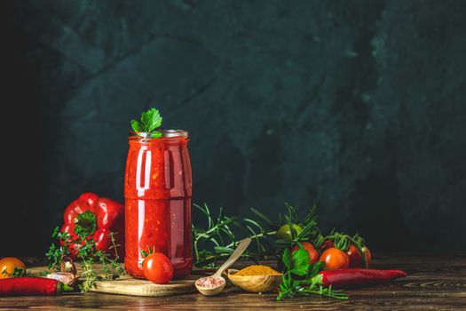 Homemade DIY natural canned hot tomato sauce chutney with chilli