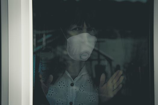 Woman with medical face mask Quarantine during Coronavirus pandemic.