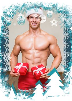 Composite image of shirtless macho man in santa hat holding gifts