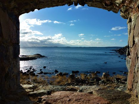 View on the baltic sea from loophole on the island of Suomenlinna