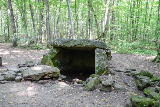 Dolmen in Shapsug. Forest in the city near the village of Shapsugskaya, sights are dolmens and ruins of ancient civilization.