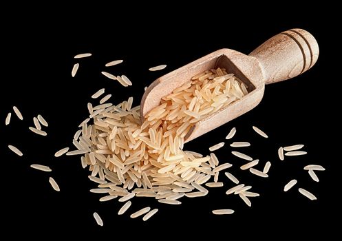 Rice in a wooden scoop
